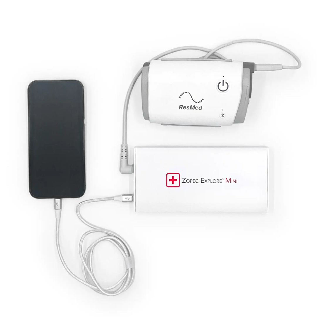 Zopec Explore Mini CPAP battery - world's smallest 1-pound medical-grade power source for ResMed/Philips machines, shown next to AirMini for size comparison